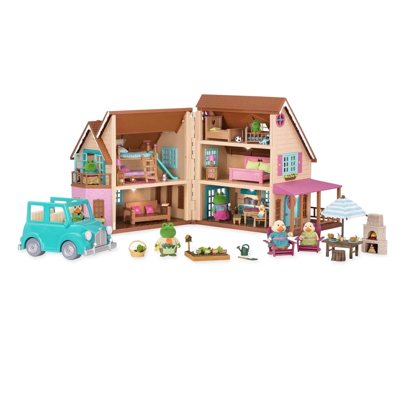 Toy house with furniture and accessories on a white background