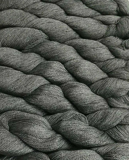 Close-up of gray braided rope texture