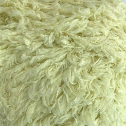 Close-up of light-colored shaggy carpet texture