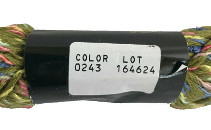 Spool of yarn with a label indicating color and lot number on a white background
