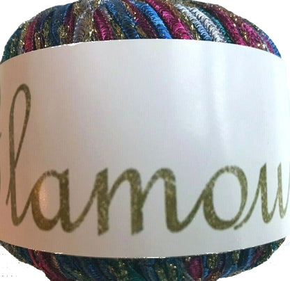 Multicolored yarn ball with a 'glamour' label on a white background