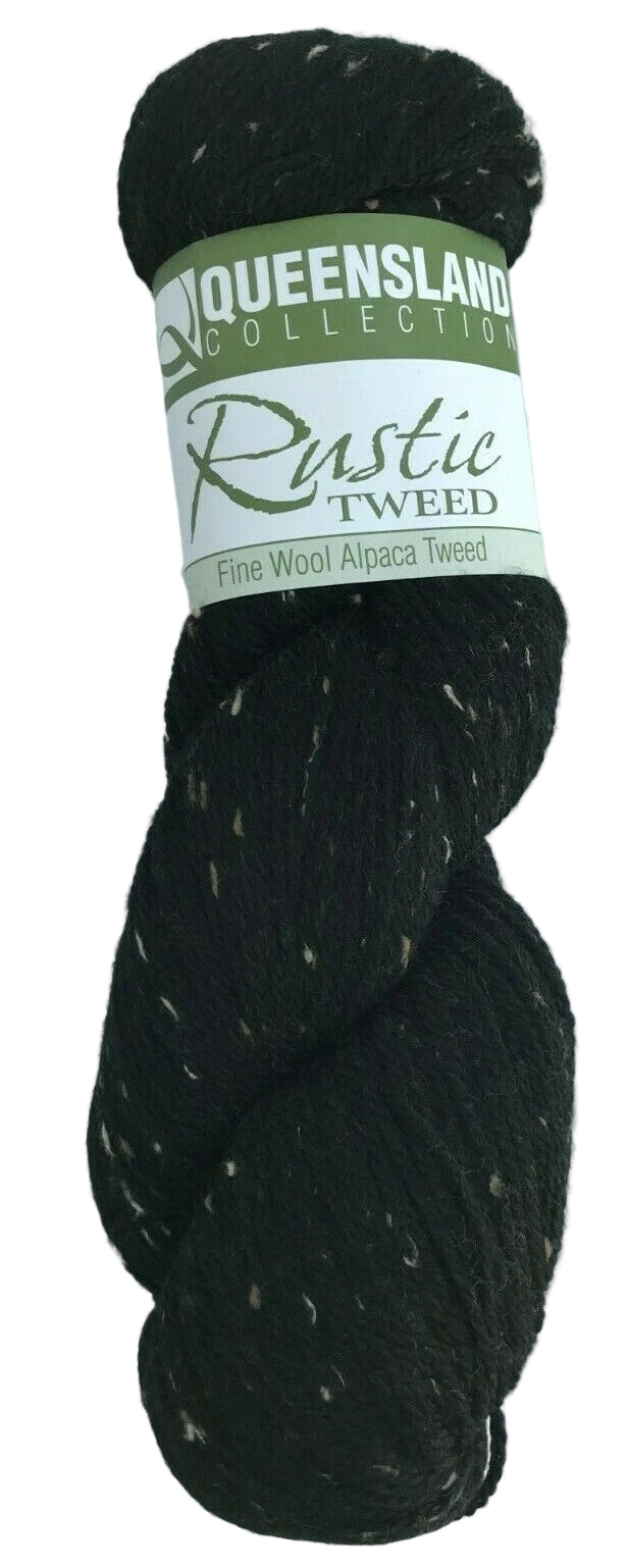 Black yarn skein with a label on a white background