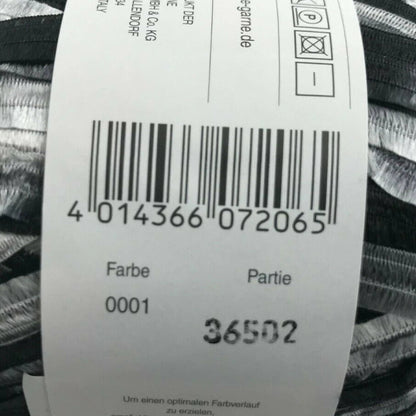 Ball of yarn with a label featuring a barcode and text on a white background