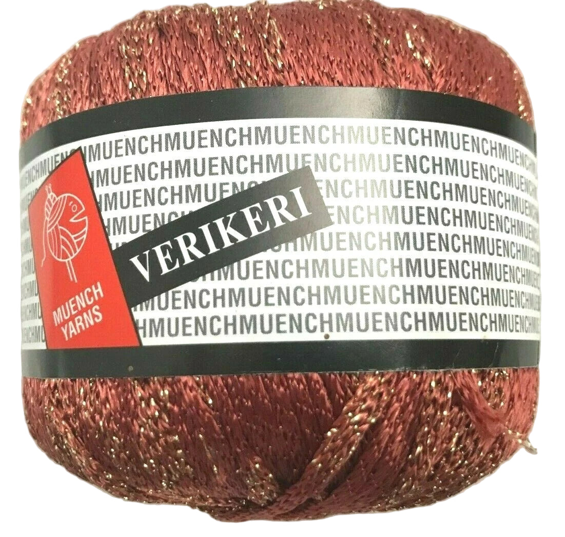 Red glitter yarn ball with Muench Yarns label on a white background