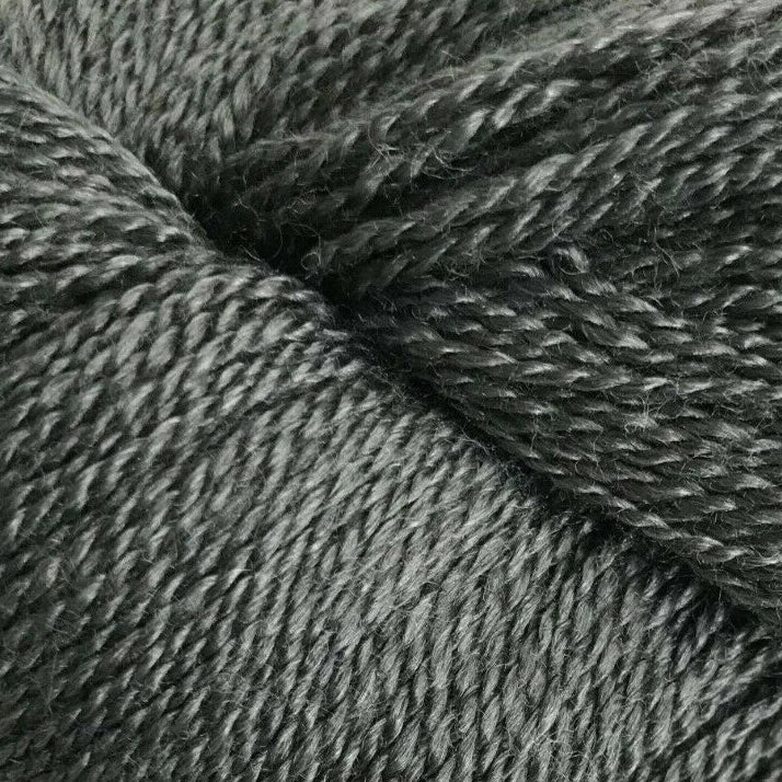 Close-up of dark gray yarn with visible texture
