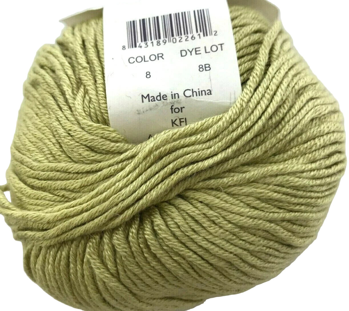 Ball of green yarn with a label on a white background
