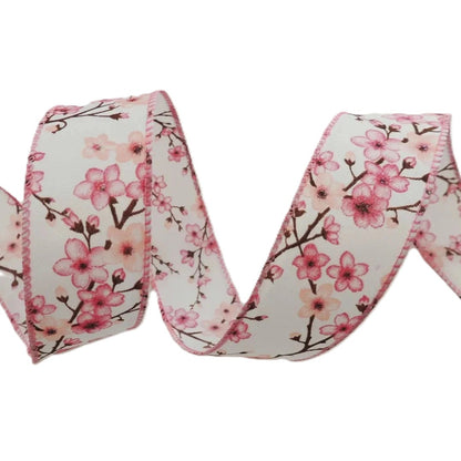 Ribbon with cherry blossom pattern on a white background
