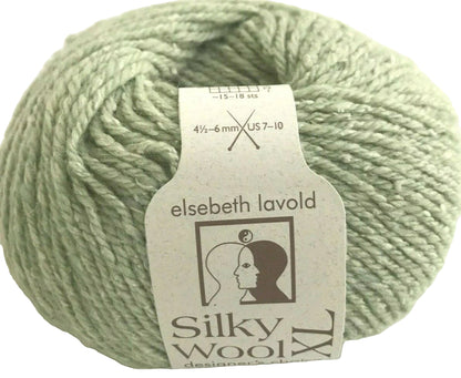 Light green skein of yarn with Elsebeth Lavold Silky Wool label on a white background