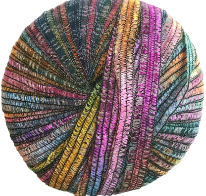Multicolored yarn ball with a textured pattern on a white background