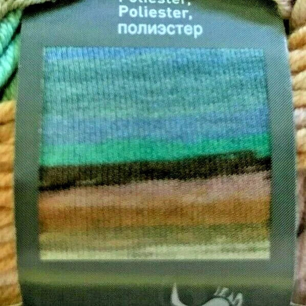 Textile label with color swatch and brand logo on a woven background