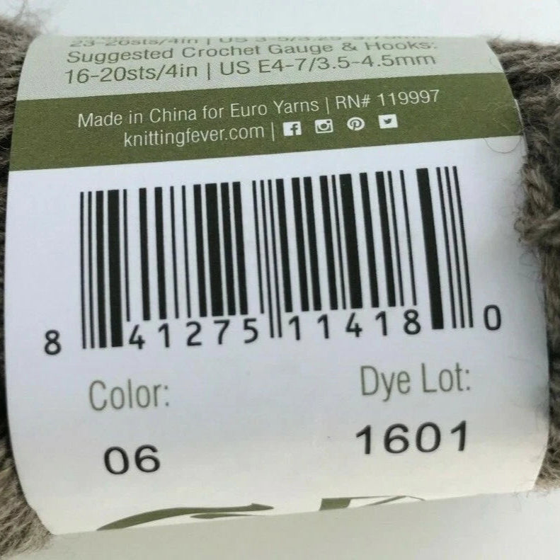 Yarn label with barcode and product details on a ball of yarn.
