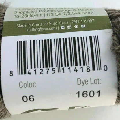 Yarn label with barcode and product details on a ball of yarn.