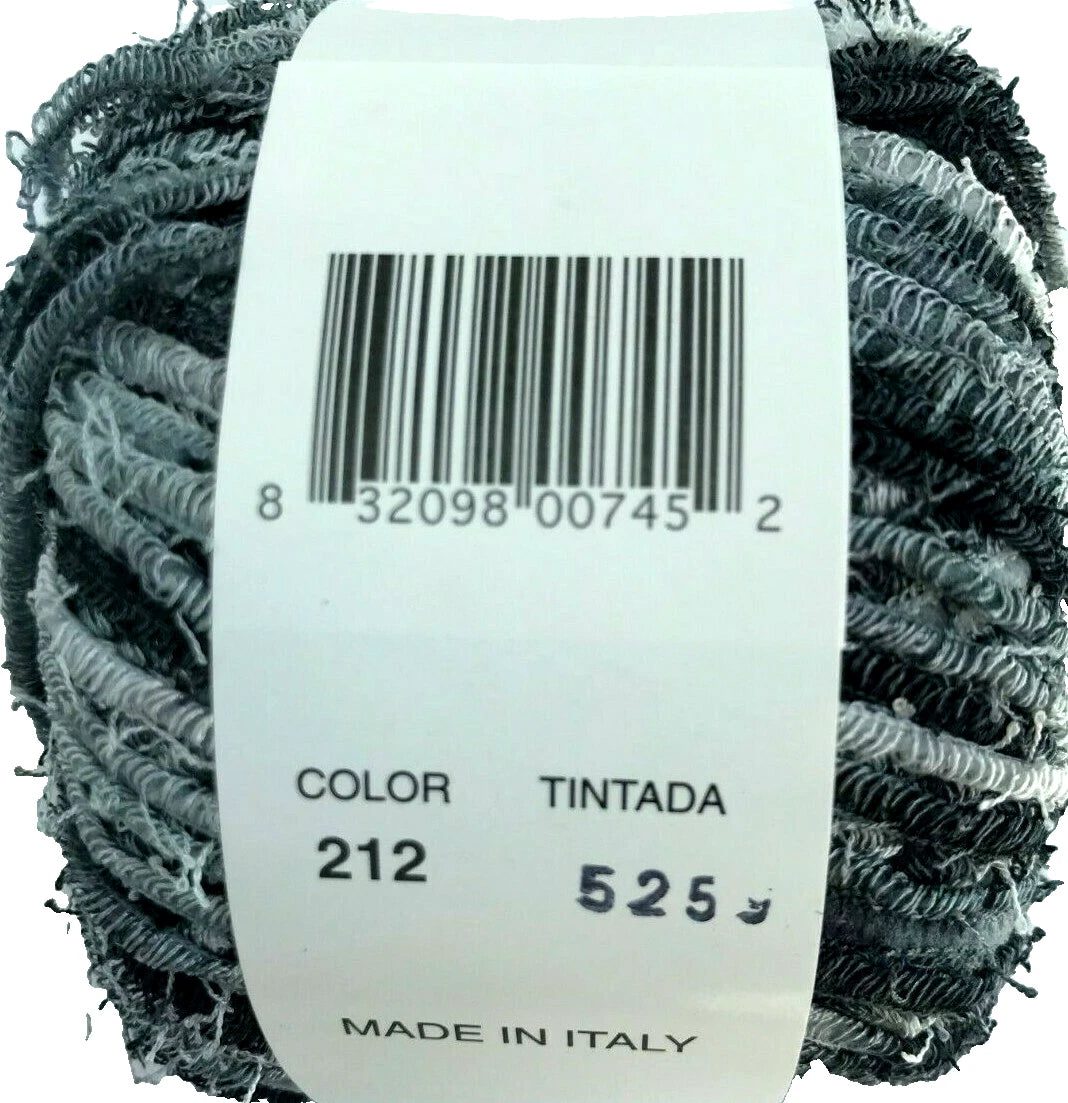 Ball of yarn with a label showing color code and origin