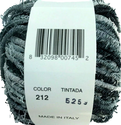 Ball of yarn with a label showing color code and origin