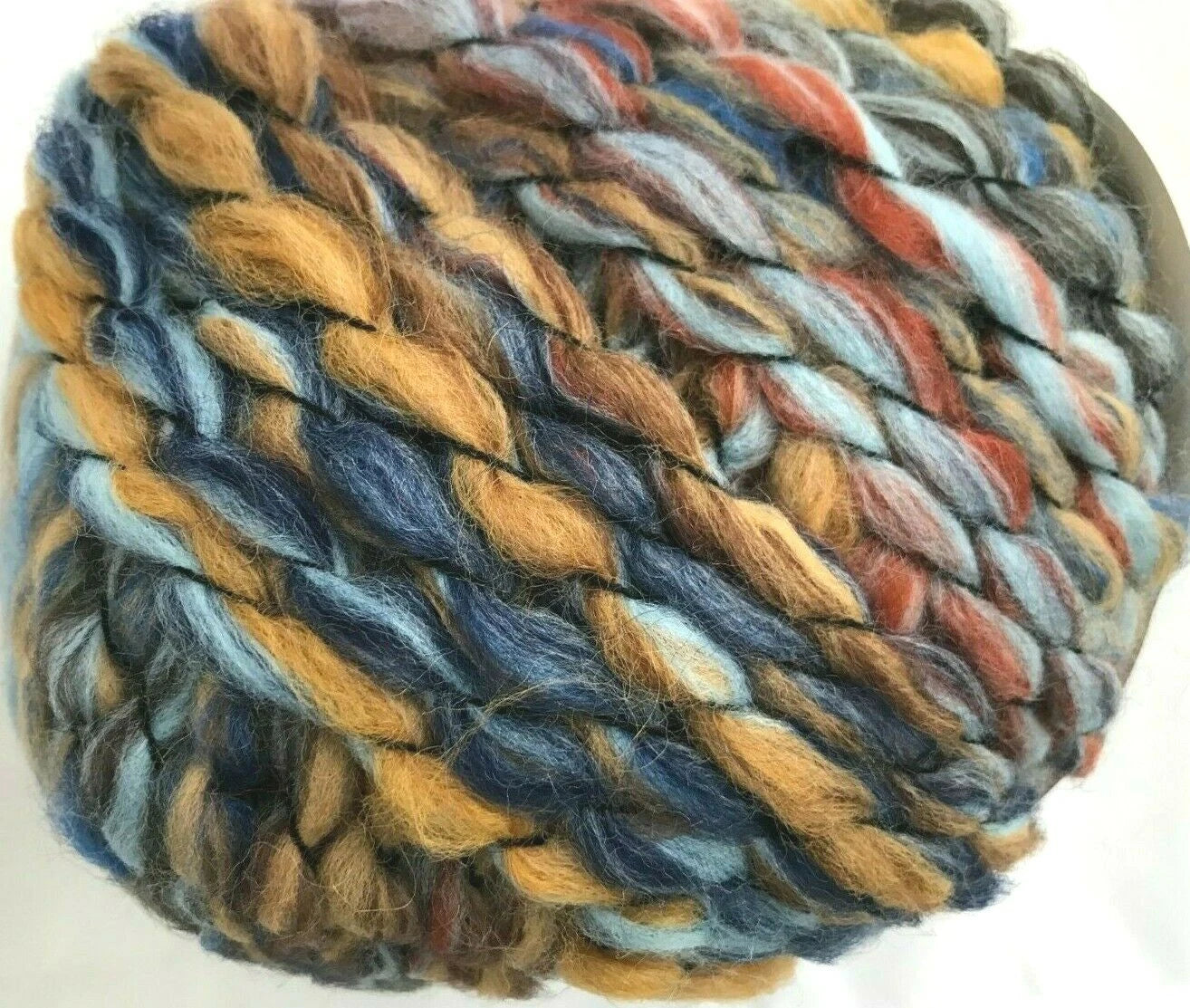 Multicolored skein of yarn on a white background
