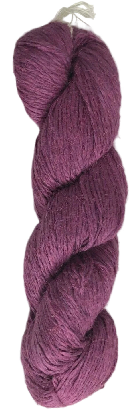 Purple skein of yarn on a white background