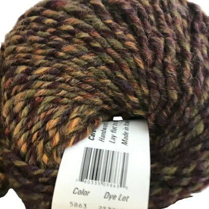 Multicolored skein of yarn with a label on a white background