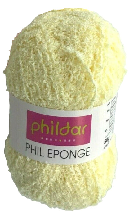 Yellow sponge with a Phildar label on a white background