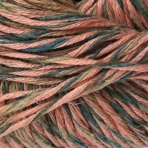 Ball of yarn with a Tahki Yarns label on a white background