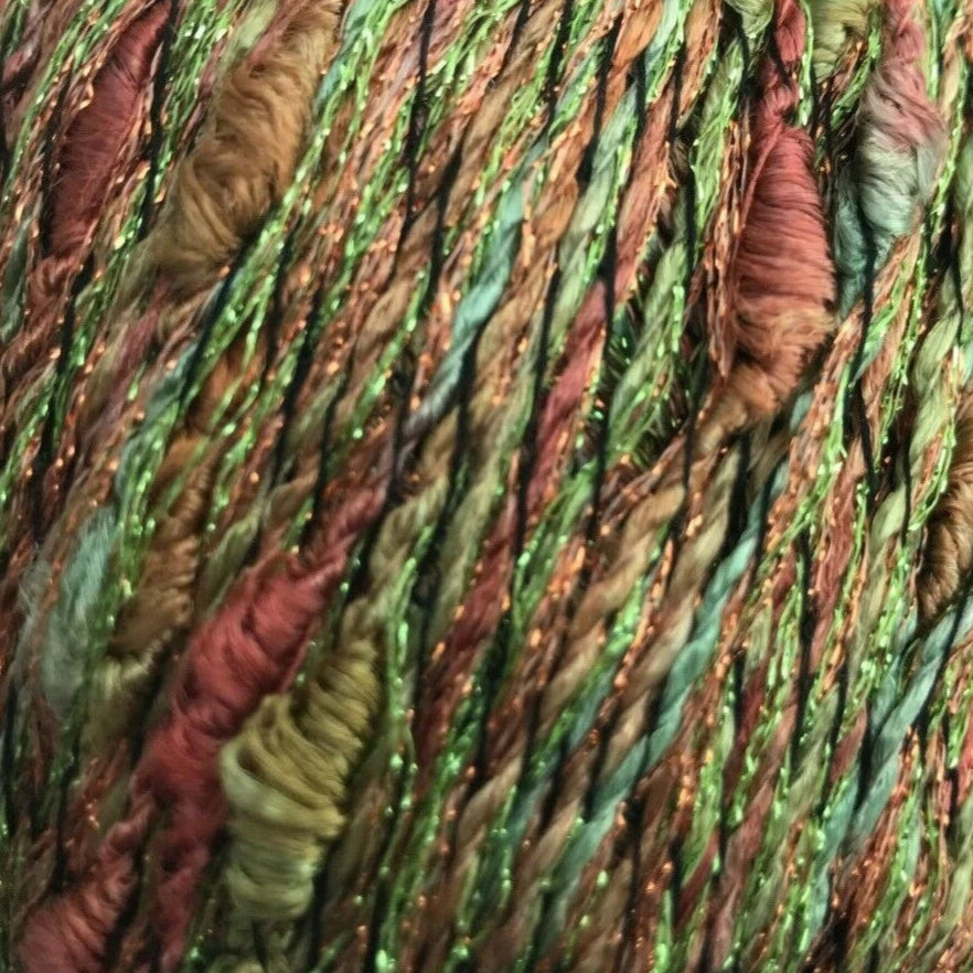 Multicolored skein of yarn with green, brown, and red tones.
