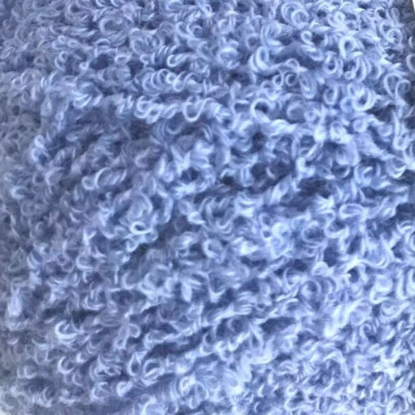 Two balls of blue yarn with a 'phililar' label on a white background