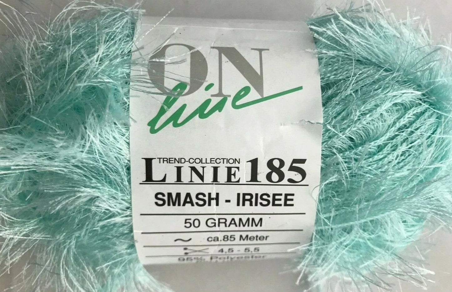 Turquoise yarn with a label reading 'ON Live Linie 185 Smash Irisee' on a light gray background