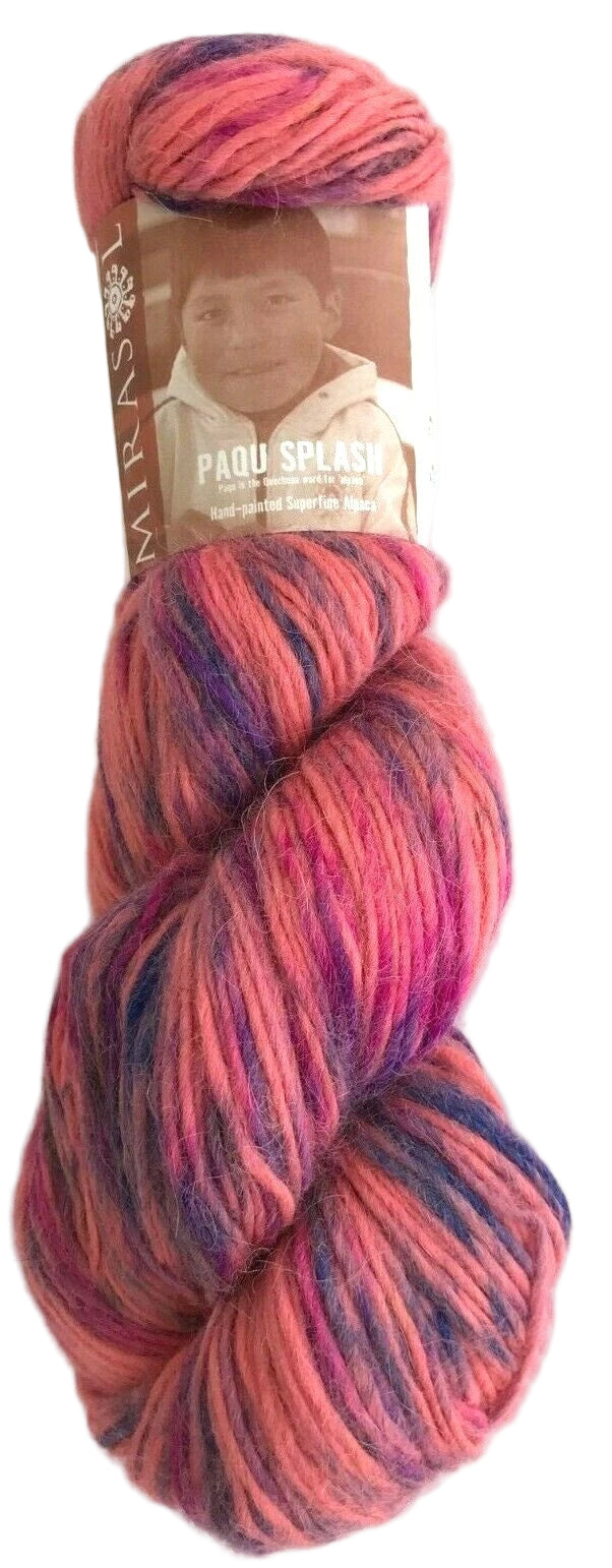 Multicolored skein of yarn with a label on a white background