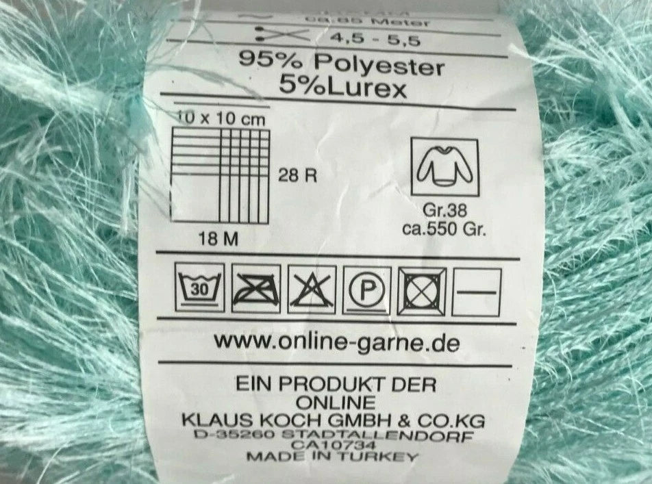 Yarn label with product details on a green yarn background