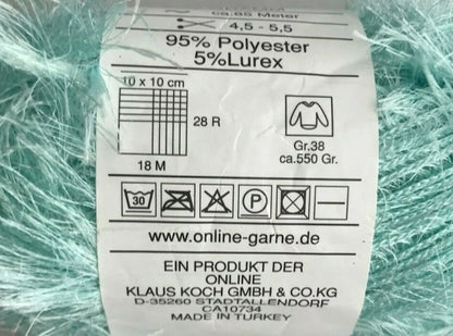 Yarn label with product details on a green yarn background