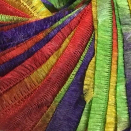 Close-up of colorful fabric with a rainbow pattern