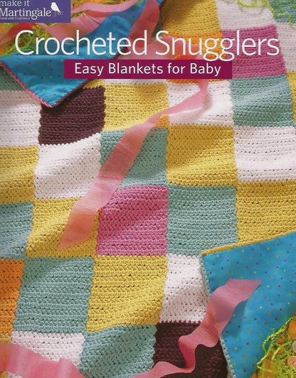 Colorful crocheted blanket with ribbons on a book cover titled 'Crocheted Snugglers: Easy Blankets for Baby'.