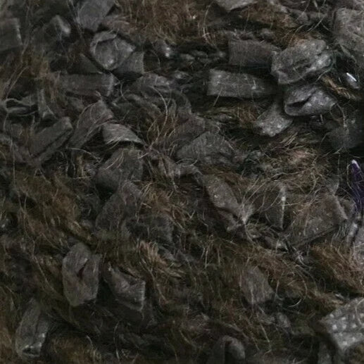 Close-up of textured dark brown fabric with a shaggy finish
