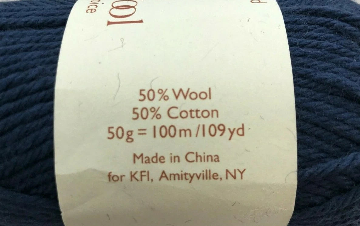 Yarn label with details on a ball of blue yarn