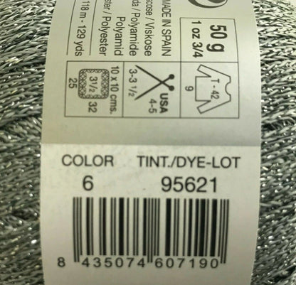 Yarn ball with label showing product details on a white background
