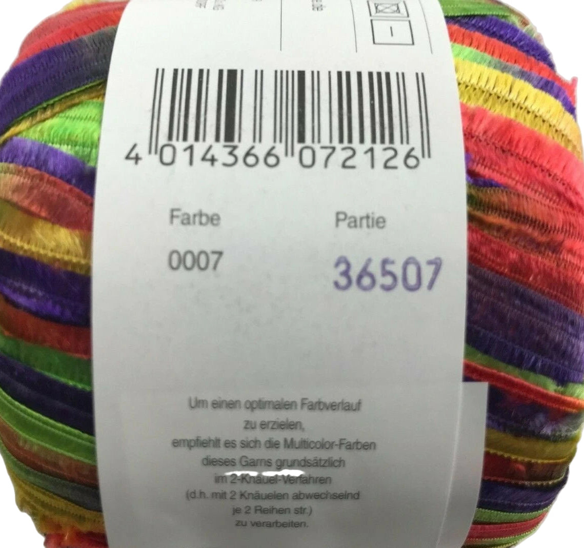 Multicolored yarn ball with a label showing a barcode and text.