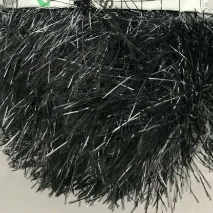 Close-up of black tinsel on a white background
