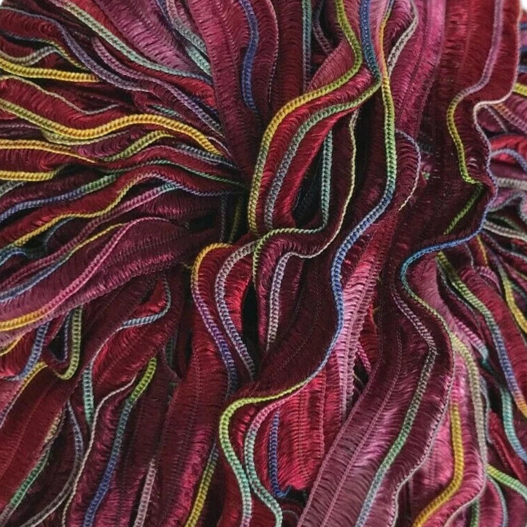 Multicolored textured fabric swatch on a white background