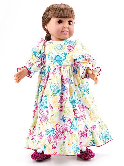 Doll wearing a colorful butterfly-patterned dress on a white background