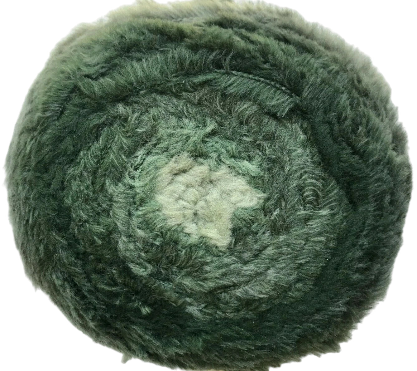Green skein of yarn on a white background