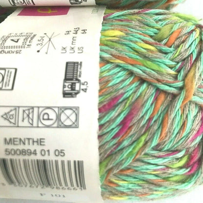 Two skeins of colorful yarn with labels on a white background