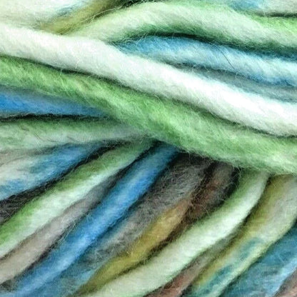 Close-up of multicolored yarn with shades of green, blue, and white.
