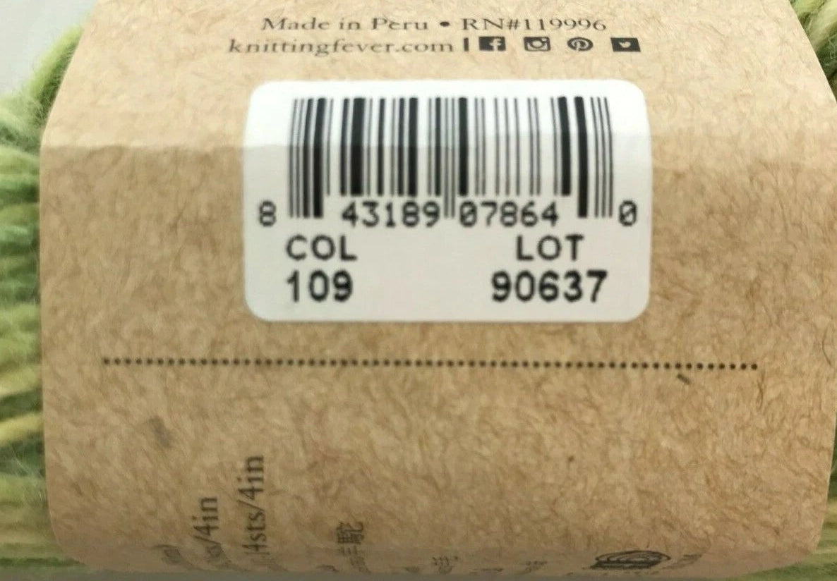 Close-up of a cardboard box with a barcode label and text, featuring green beans in the background.