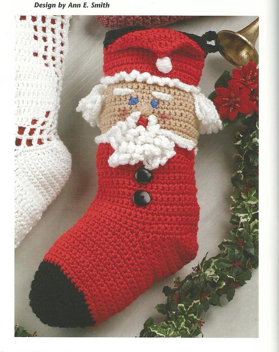 Crocheted Santa Claus stocking with a wreath in the background
