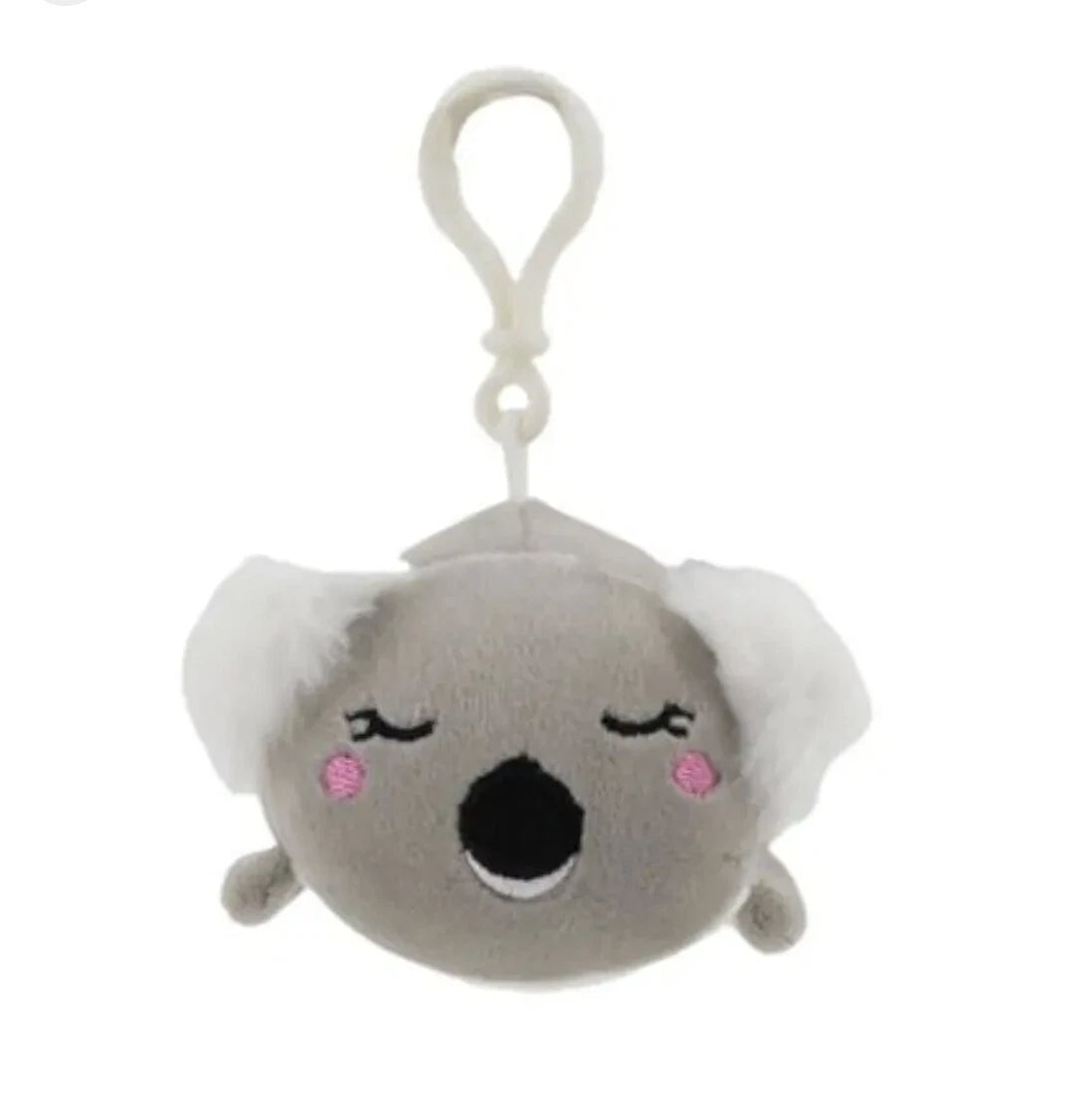 Plush keychain shaped like a koala with a white hat on a white background