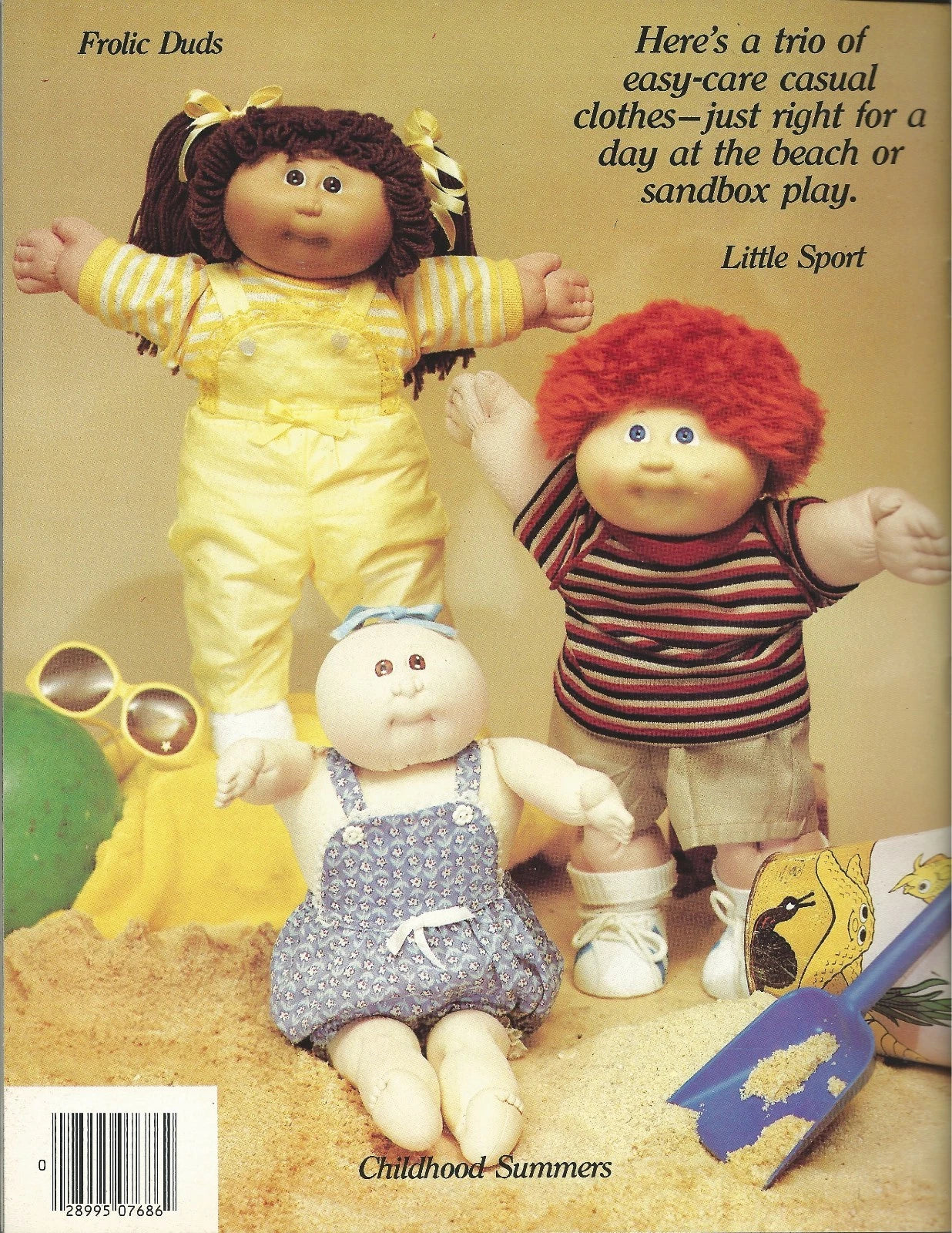 Three dolls with beach-themed outfits on a sand background, with text about casual clothes for beach or sandbox play.