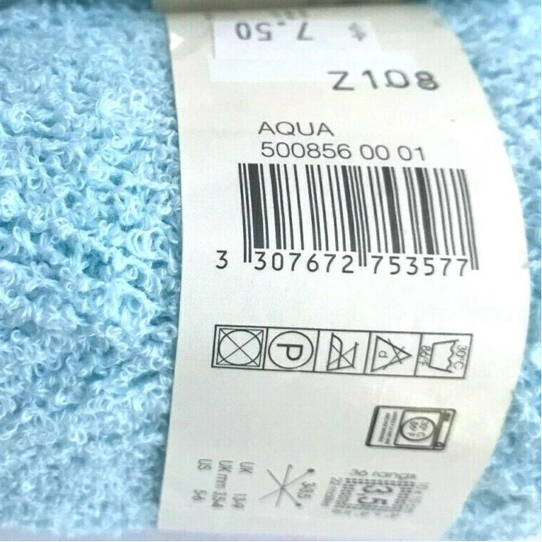 Two balls of light blue yarn with labels on a white background
