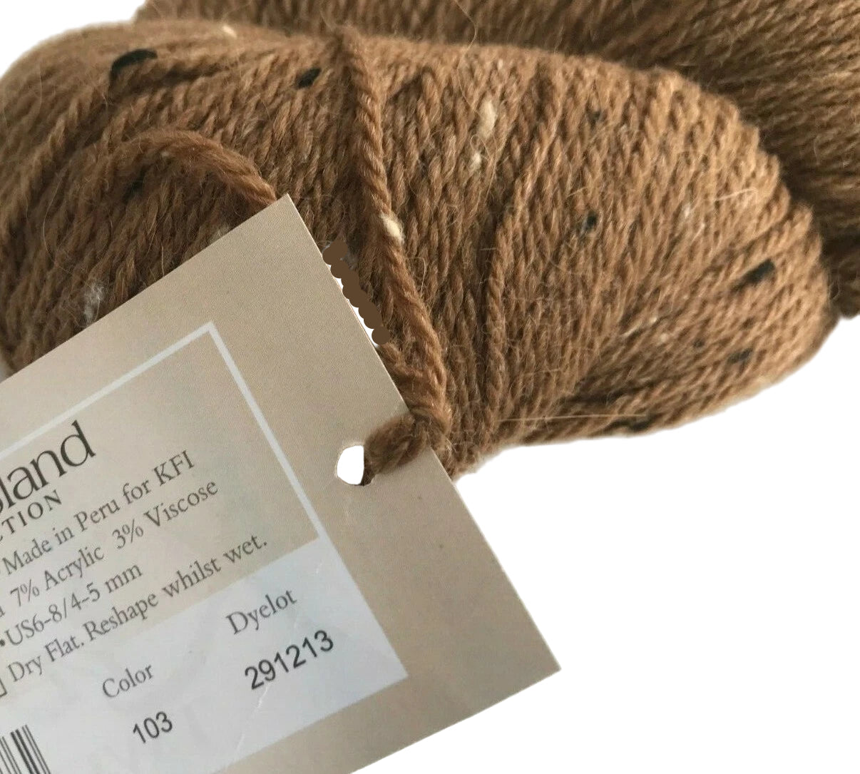Brown yarn ball with a label on a white background