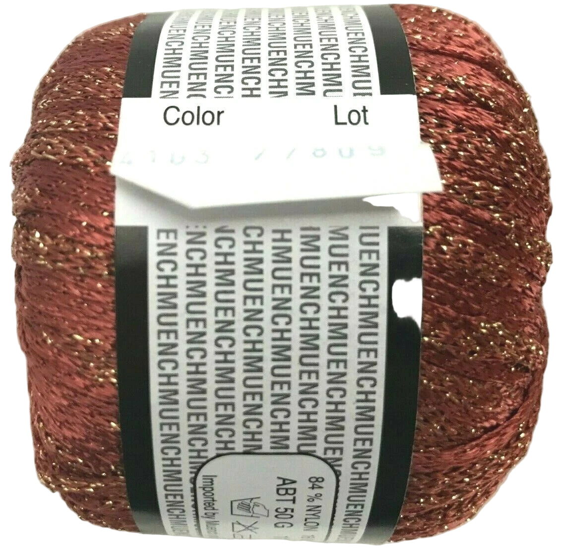 Ball of red glittery yarn with a label on a white background