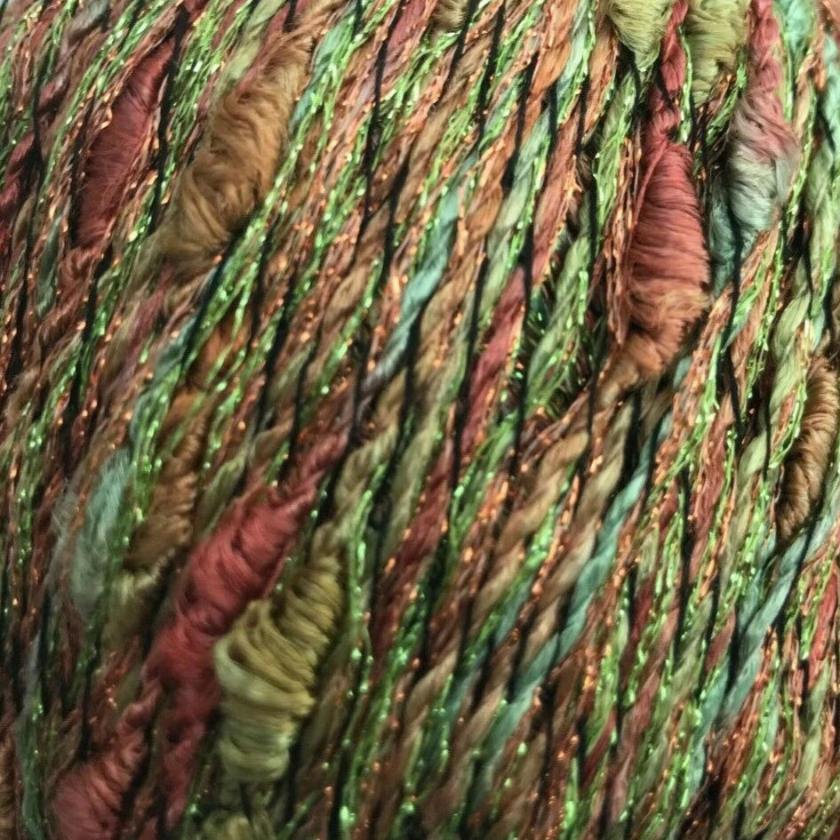 Multicolored skein of yarn with green, brown, and red tones.