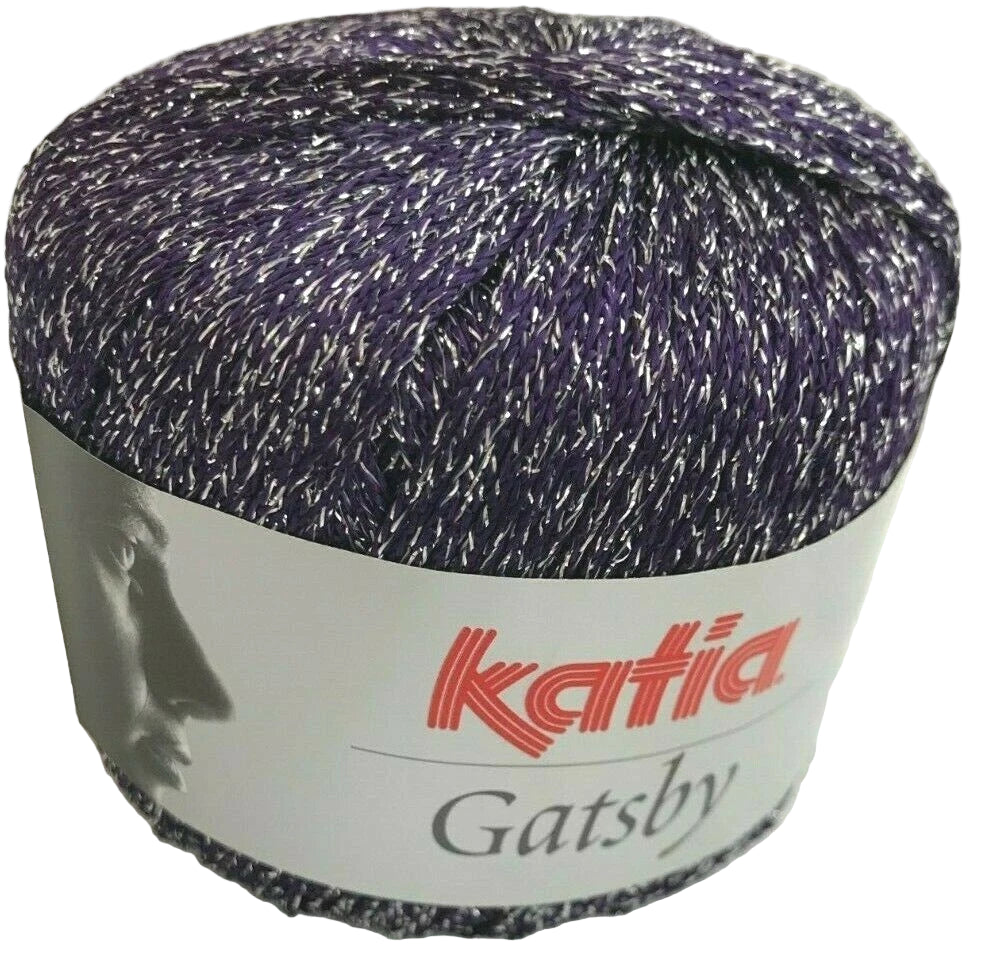 Spool of purple and gray yarn with 'Katia Gatsby' label on a white background